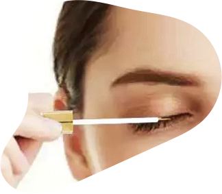 woman putting eyebrow enhancing growth serum